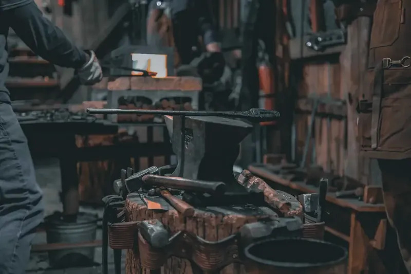 Forge anvil with tools